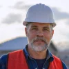 Experienced mason in a hard hat at Unity Restoration NYC